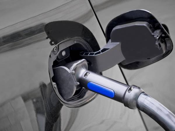 close-up-electric-car-being-charged